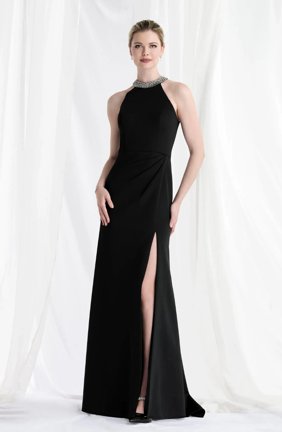 model is wearing a black high neck sleeveless mother of the bride gown
