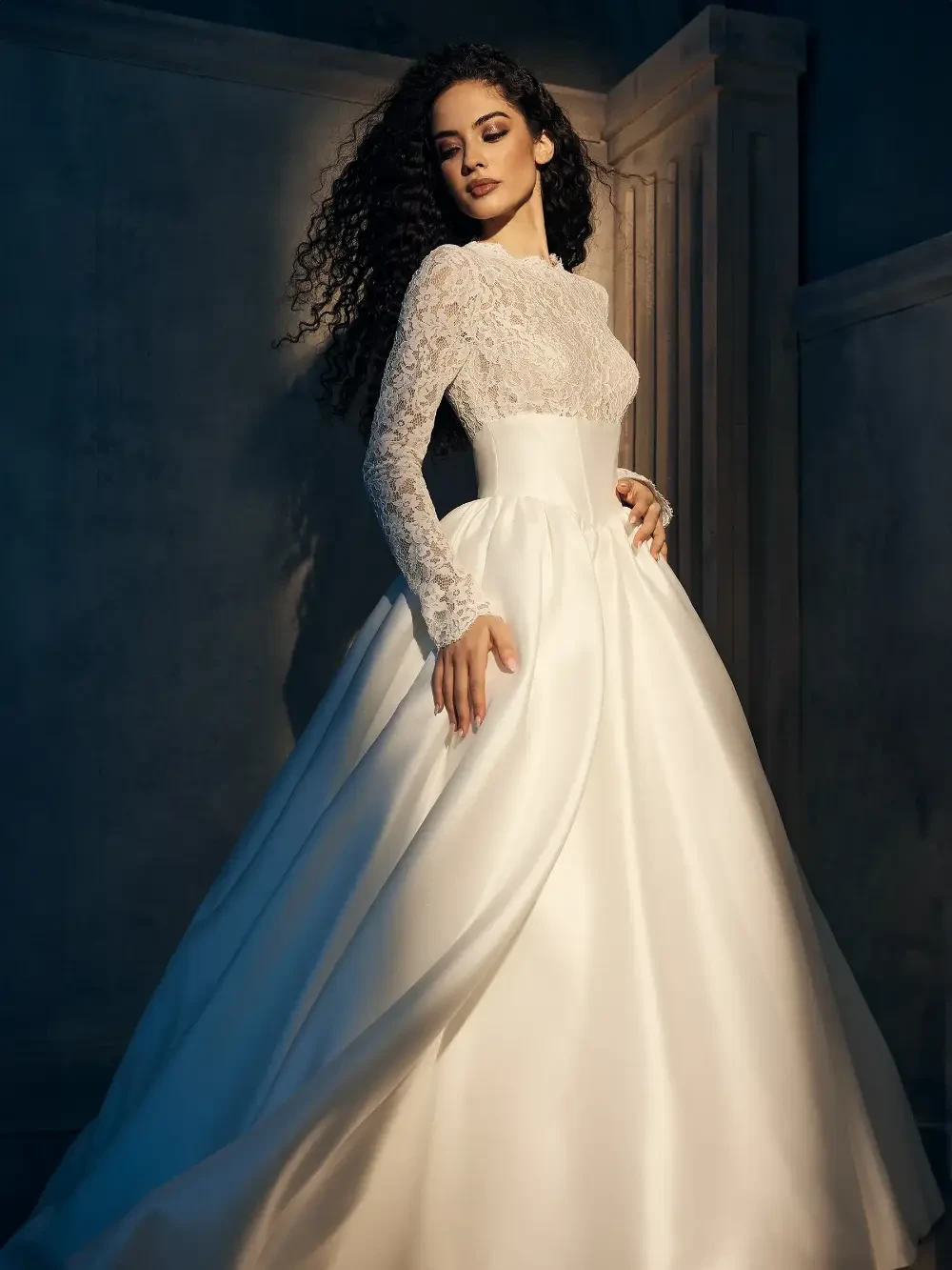 Model wearing a Justin Alexander Gown