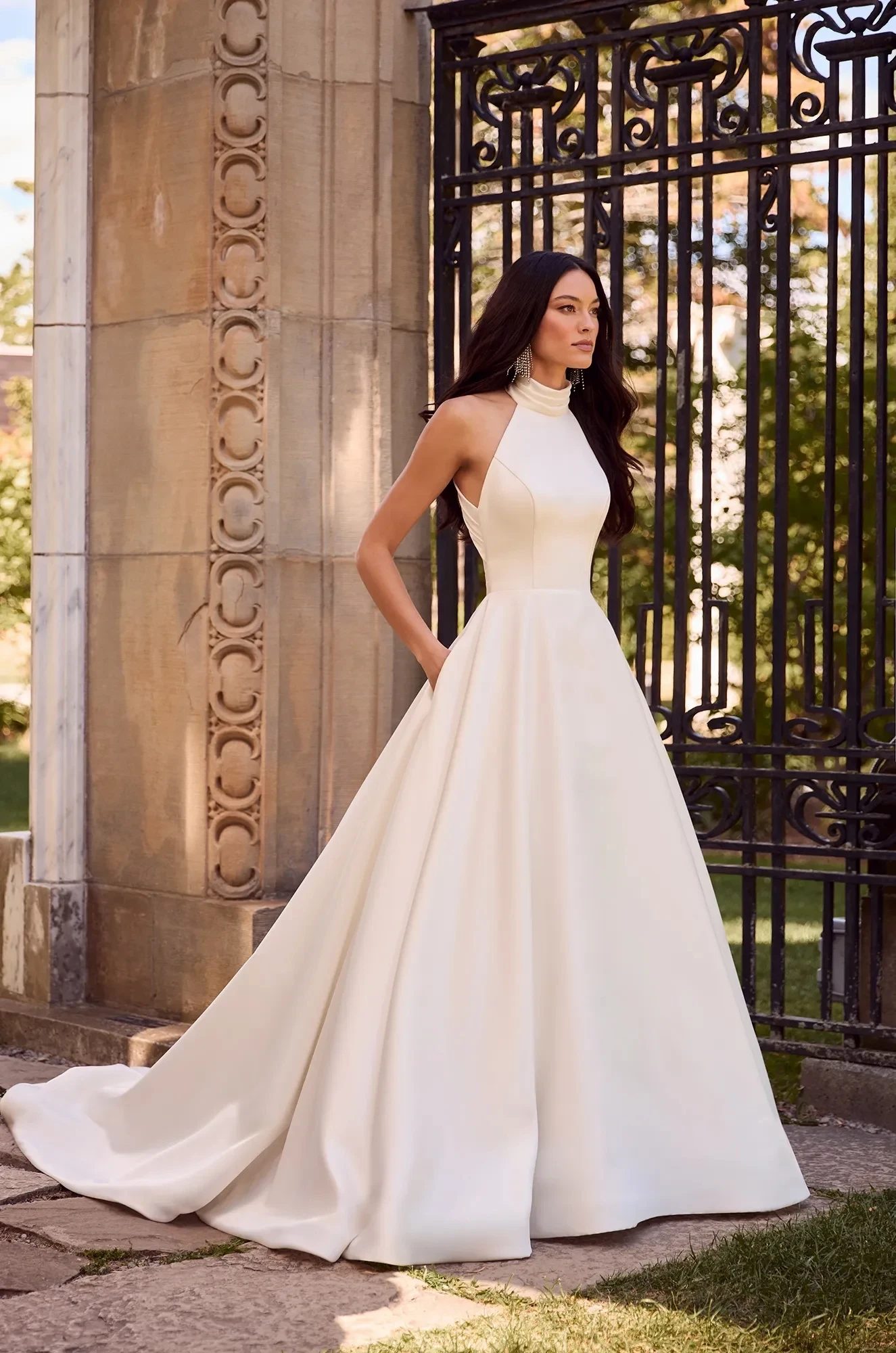 Model wearing a Paloma BlancaGown